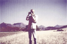 José with camera in Namibia, 1988